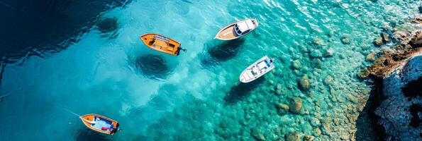 AI Generated Top-down aerial view of boats on clear blue waters with rocky coastline. Copy space photo