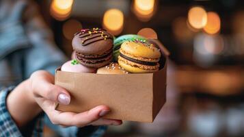 AI generated Colorful macarons in a box held by a hand, sweet treats and desserts displayed in vibrant packaging photo