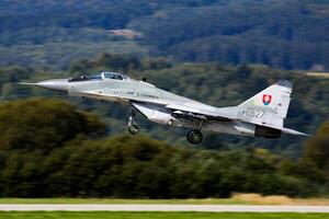 Sliac, Slovakia, 2016 - Military fighter jet plane at air base. Air force flight operation. Aviation and aircraft. Air defense. Military industry. Fly and flying. photo