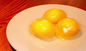 chicken eggs on white background, Fresh orange chicken eggs, concept for healthy cooking and kitchen video