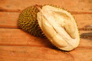 durian fruit on the wood table, closeup of photo