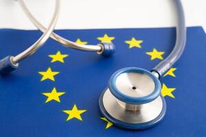 Stethoscope on EU flag background, Business and finance concept. photo