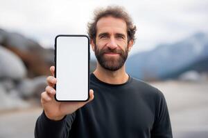 ai generado hombre participación y señalando a un teléfono con blanco pantalla foto