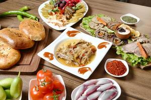 Wooden Table With Plated Food photo