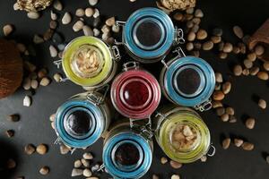 Assorted Jars Filled With Various Types of Food photo