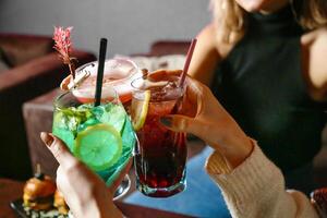 Group of People Holding Drinks at a Party photo