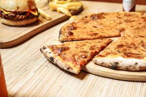 Pizza on Wooden Cutting Board photo