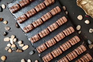 Assorted Chocolates and Nuts Arranged on a Table photo