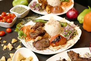 Table Adorned With a Variety of Delicious Dishes and Fresh Vegetable Bowls photo