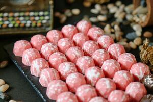 Abundance of Pink and White Candies Adorning a Table photo