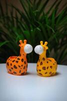 Giraffe Figurines on Table - Whimsical Decor Accent photo