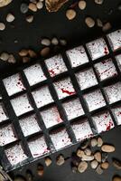 Black Table With Assorted White and Red Food photo