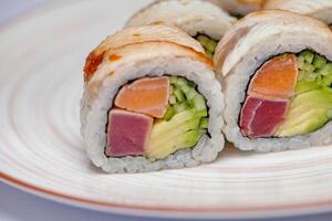 White Plate With Sushi and Avocado photo