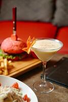 Delicious Plate of Food and Refreshing Drink on Table photo