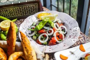 Fresh Salad With Vegetables on a White Plate photo