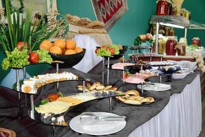 Assorted Food Spread on Buffet Table photo