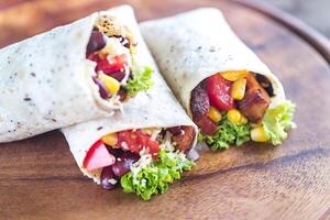 Three chicken burritos photo