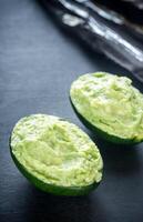 Guacamole in avocado shells photo