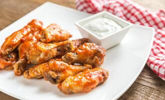 Portion of buffalo chicken wings photo