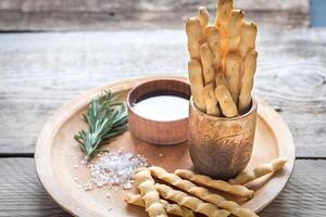 Rosemary breadsticks with ingredients photo