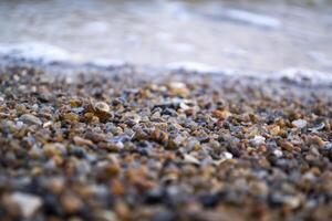 The small pebble macro shot. Small stones background. photo