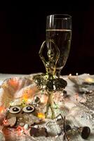 The glasses of champagne and christmas decoration. photo