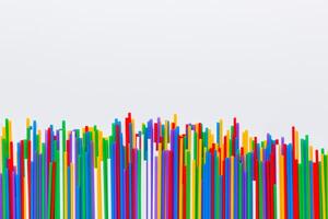 Heap of colorful plastic drinking straws on Colored background, flat lay. Copy Space for text photo