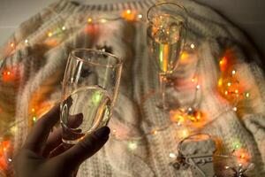 The glasses of champagne and christmas decoration. photo