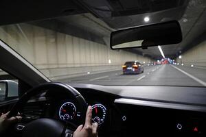 Driving a Car in Tunnel photo