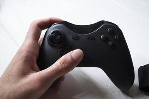 Joystick in hand photo