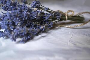 The bouquet of dried lavender on the desk. Close up. photo