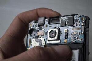 Phone motherboard. Service repair. photo