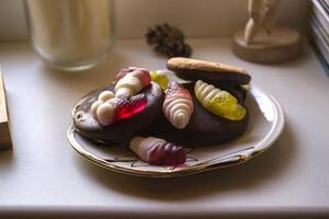 Sweet candies in a saucer. photo