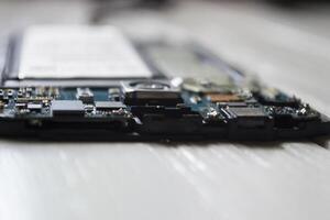 Phone motherboard. Service repair. photo