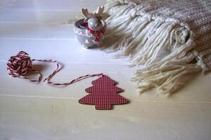 Candle and christmas decorations. Top view. Preparation for Christmas. photo