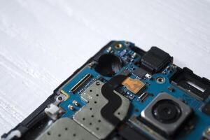 Phone motherboard. Service repair. photo