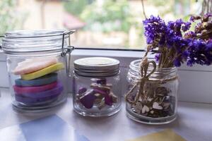 A jars on the window sill. photo