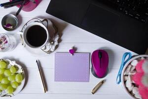 Female workplace top view. Business flat lay. photo