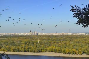 Autumn landscape of Kyiv, Ukraine. Dnipro river. View on Trukhaniv Island. photo