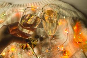 The glasses of champagne and christmas decoration. photo