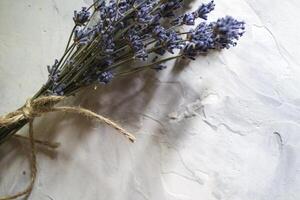 The bouquet of dried lavender on the desk. Close up. photo