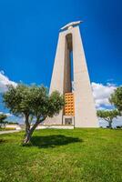 The Christ the King statue in Lisbon, Portugal photo