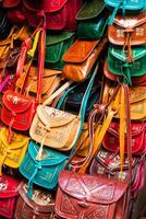 Colorful leather handbags collection on Tunis market photo