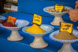 Spices on sale by weight at a shop in the Old Souq in Tunis, Tunisia photo