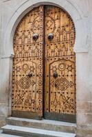 Typical local door of traditional home Tunis Tunisia photo