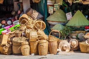 Beautiful vivid oriental market with baskets full of various spices photo