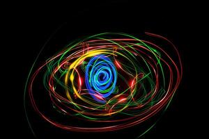 Moving swirls of colored lights photo