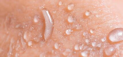 Collagen And Hyaluron Serum Gel On Skin. Splashing of Hyaluron gel. photo