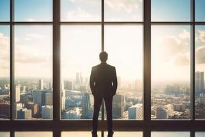 AI generated Man Standing in Front of Window, Looking Out at City photo