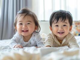 ai generado dos linda asiático niños pequeños son sonriente y mirando a el cámara. brillante dormitorio interior. foto